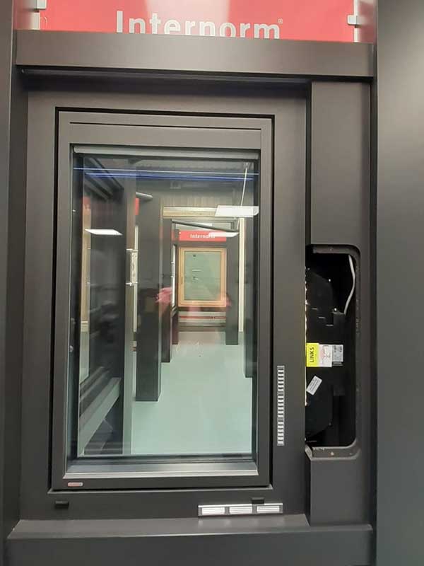 Internorm tilt & turn window with integrated blinds and electric operated trickle vent Internorm tilt & turn window with integrated blinds and electric operated trickle vent