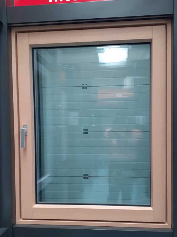 Contemporary Internorm aluminium clad timber tilt & turn window